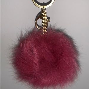 Dark pink/ purple puff ball with gold chain
